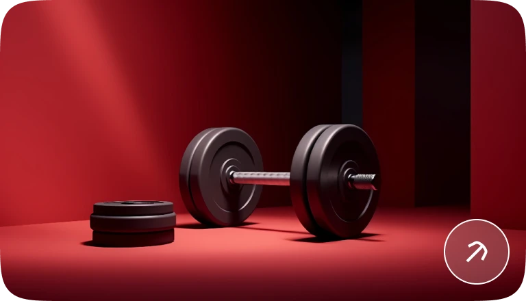 A dumbbell and weight plates against a red background